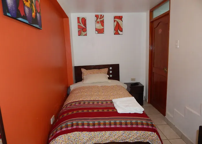 Qori Punku 2*