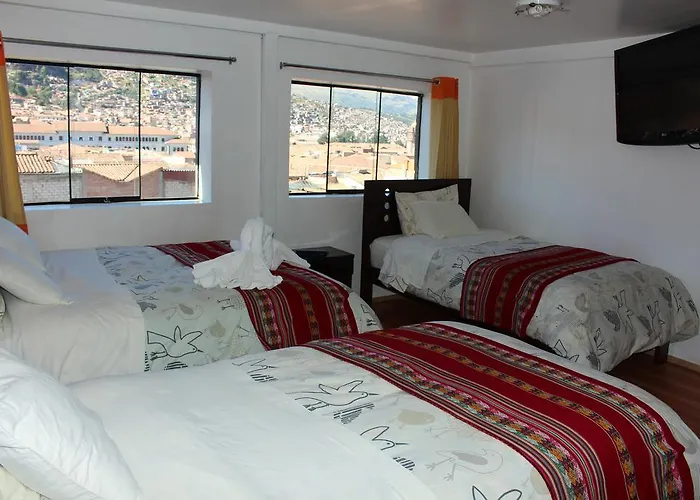 Qori Punku 2*